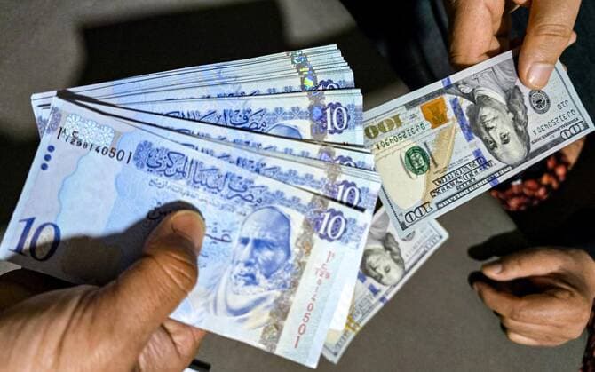 Local currency exchange desk at Awail Al-Naqd